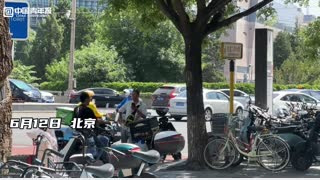 高温下的快递小哥:“多赚点”是最大期望